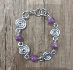 Bracciale spirali pietre lilla in ceramica