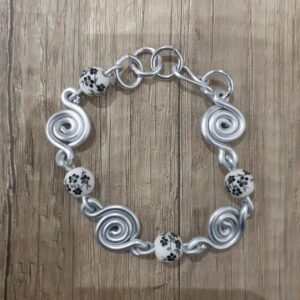 Bracciale spirali pietre con fiori neri